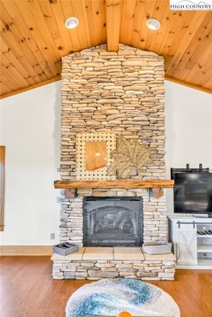 a kitchen with stainless steel appliances a stove a sink and cabinets