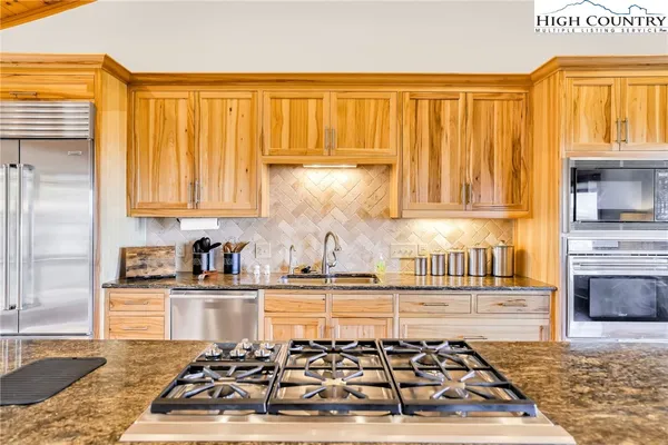 a bathroom with a bathtub and a sink