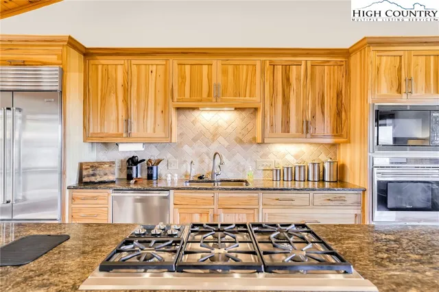 a bathroom with a bathtub and a sink