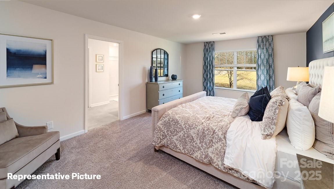 195 Superstar Street Salisbury, NC 28147 - Photo 22 of 35 a bedroom with a bed and a dresser