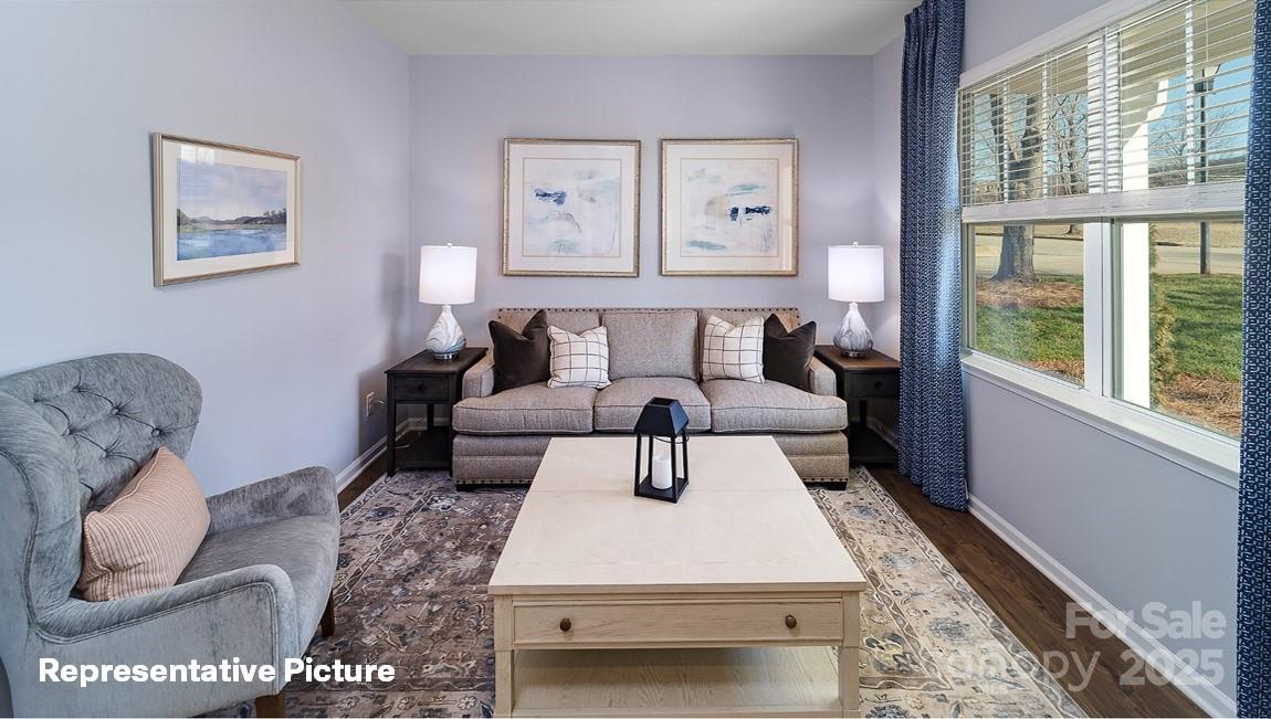 195 Superstar Street Salisbury, NC 28147 - Photo 5 of 35 a living room with furniture and a large window