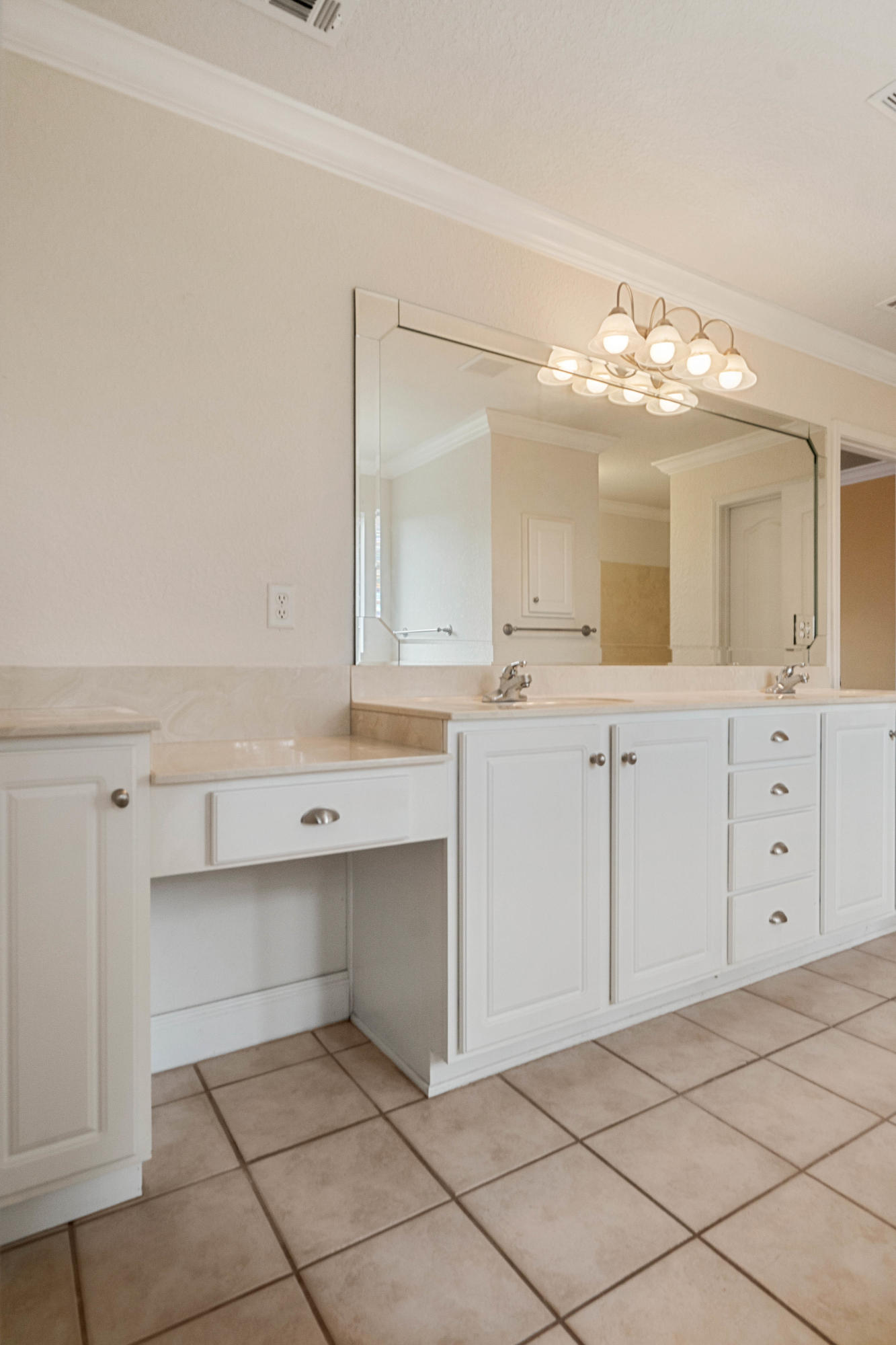 414 Driftwood Point Road Santa Rosa Beach, FL 32459 - Photo 24 of 36 a spacious bathroom with a double vanity sink and a mirror