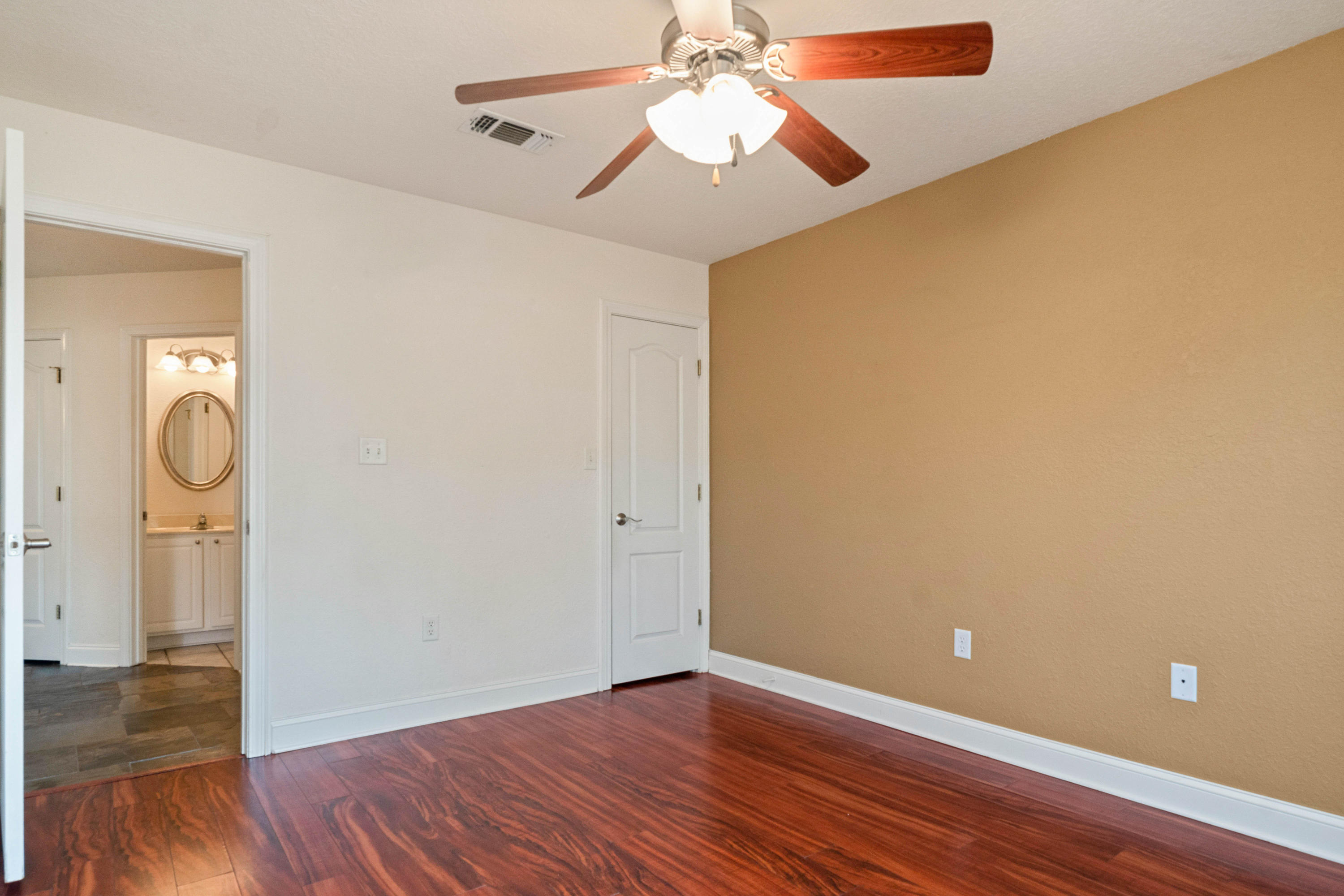 414 Driftwood Point Road Santa Rosa Beach, FL 32459 - Photo 30 of 36 a view of an empty room with wooden floor