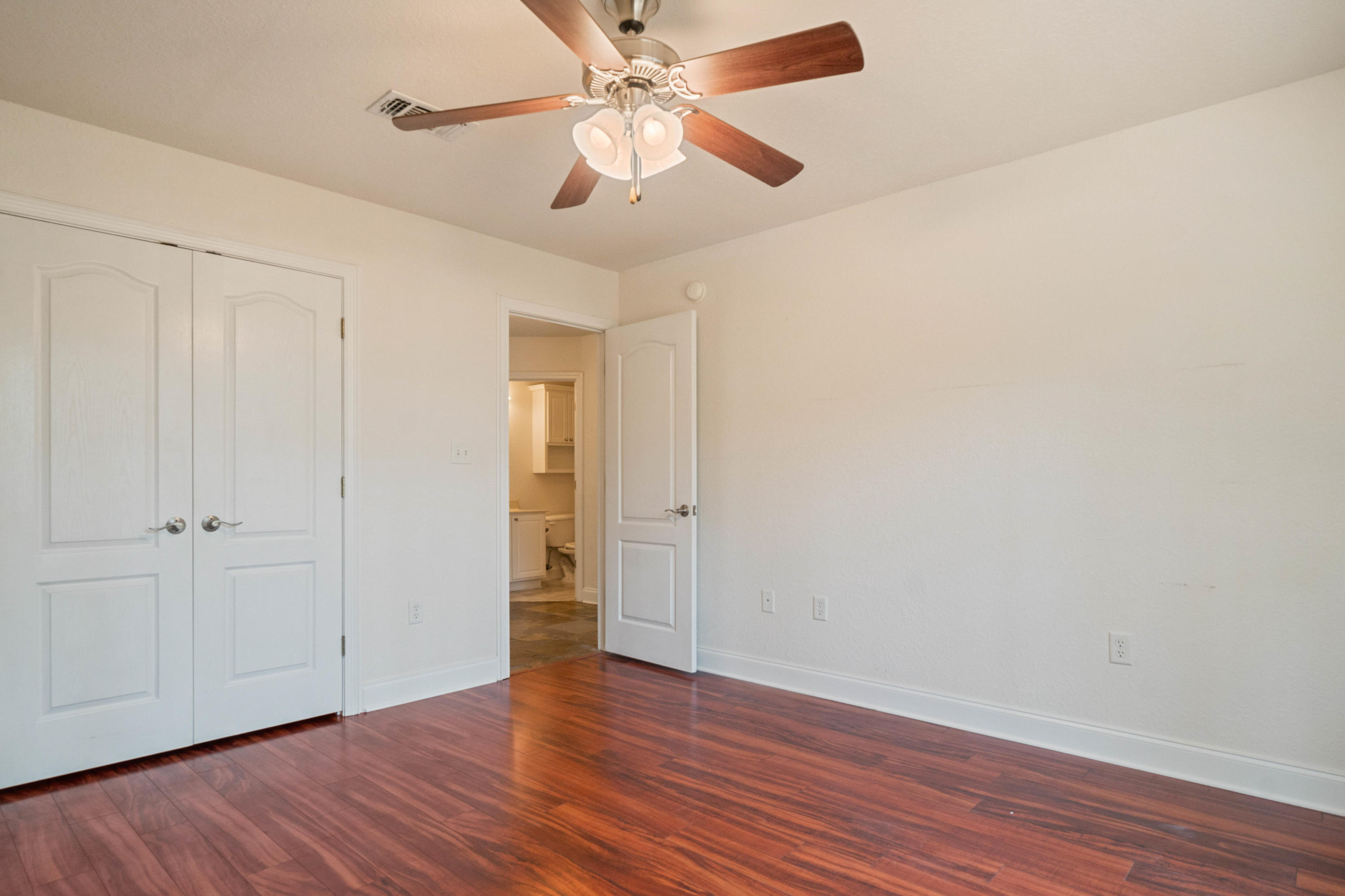 414 Driftwood Point Road Santa Rosa Beach, FL 32459 - Photo 32 of 36 a view of an empty room and wooden floor