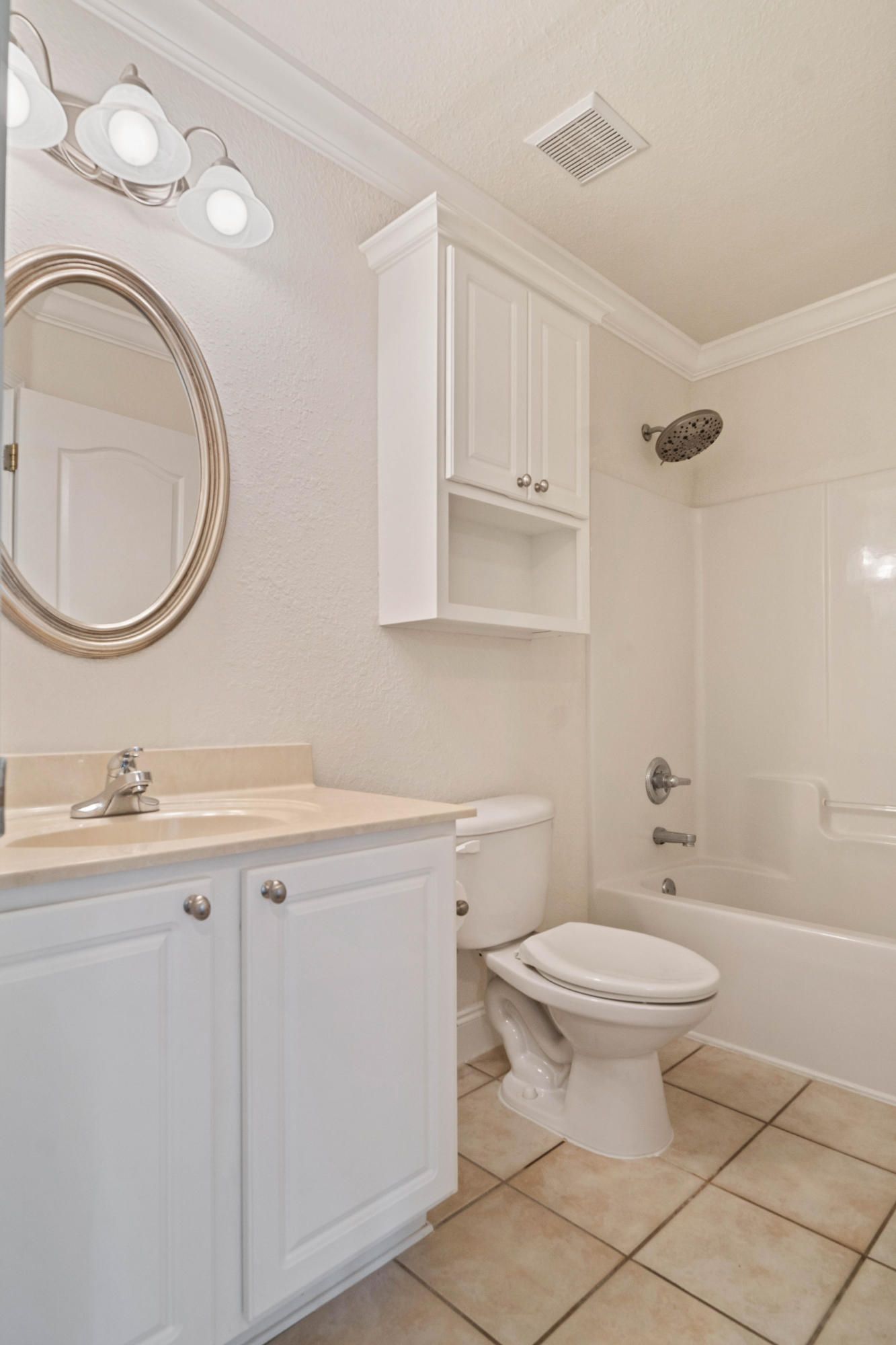 414 Driftwood Point Road Santa Rosa Beach, FL 32459 - Photo 33 of 36 a bathroom with a granite countertop toilet a sink and a mirror