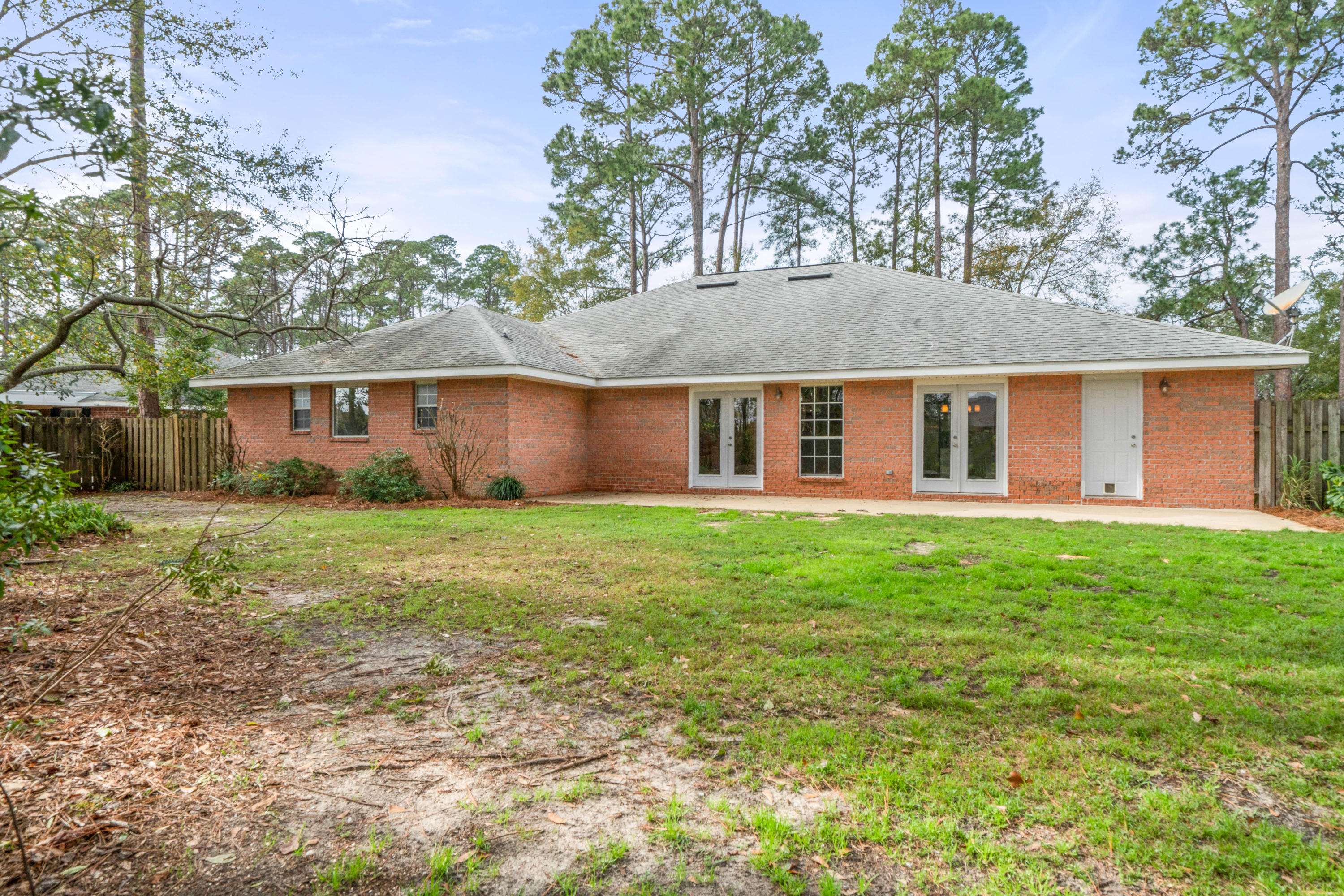 414 Driftwood Point Road Santa Rosa Beach, FL 32459 - Photo 36 of 36 a front view of house with yard and green space