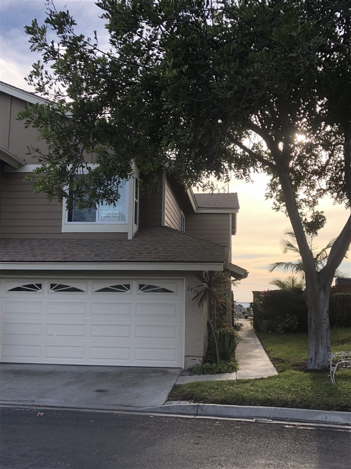 2939 Lancaster Road Carlsbad, CA 92010 - Photo 1 of 14 Front view looking through open gate toward ocean