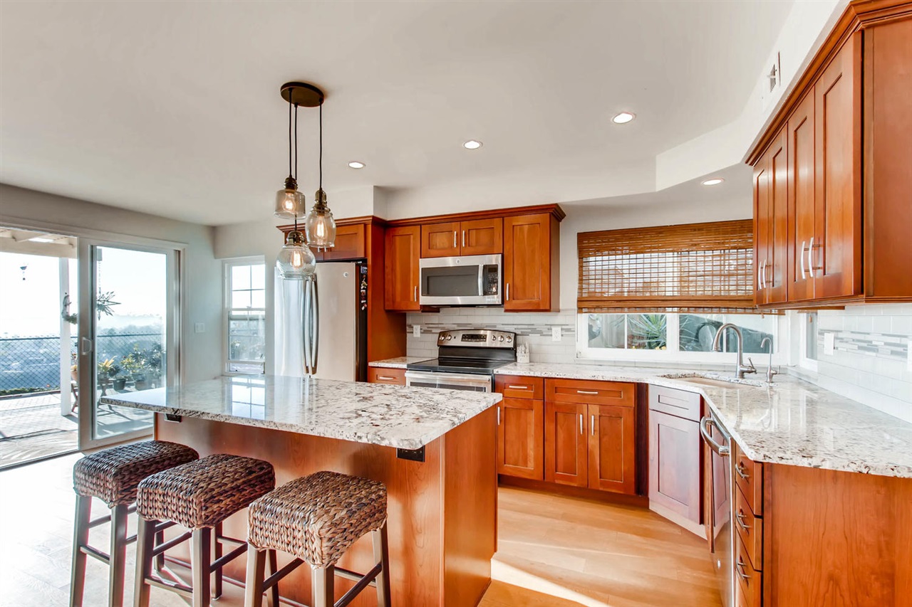 2939 Lancaster Road Carlsbad, CA 92010 - Photo 6 of 14 Newly remodeled gourmet kitchen with expansive views of ocean, canyon, and beautiful sunsets.