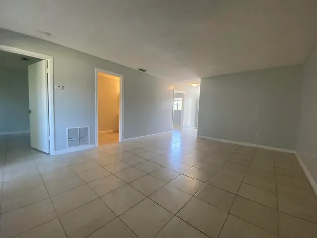 en empty room with a window