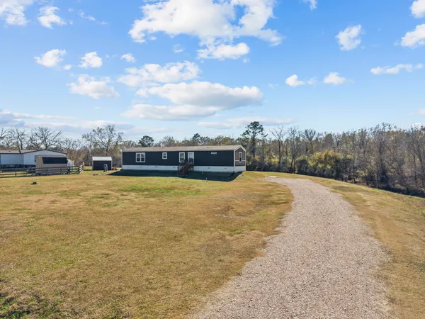 a view of swimming pool with outdoor seating and mountain view
