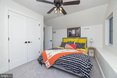 a kitchen with stainless steel appliances a sink stove and refrigerator