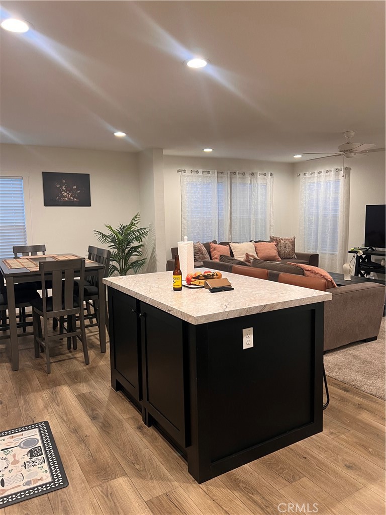 3444 West Center Street, Unit 43 Riverside, CA 92501 - Photo 6 of 16 a kitchen with a sink and cabinets