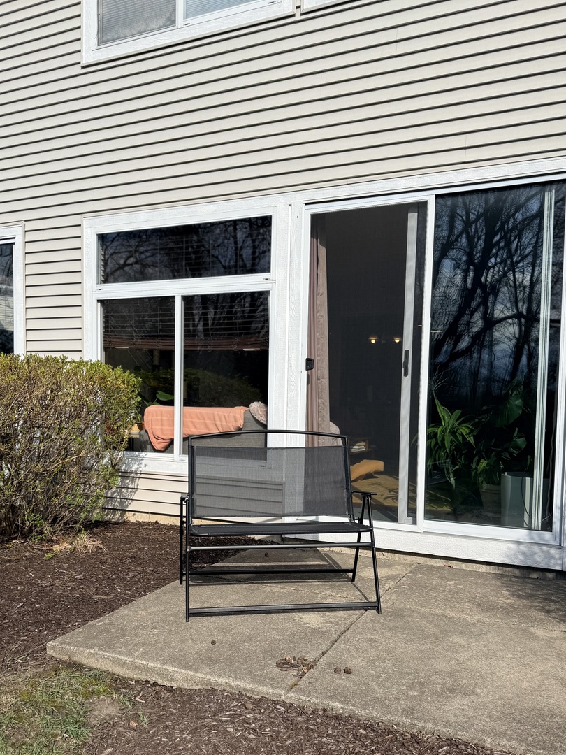 1159 East Addison Avenue Lombard, IL 60148 - Photo 12 of 14 a view of a bench in front of house