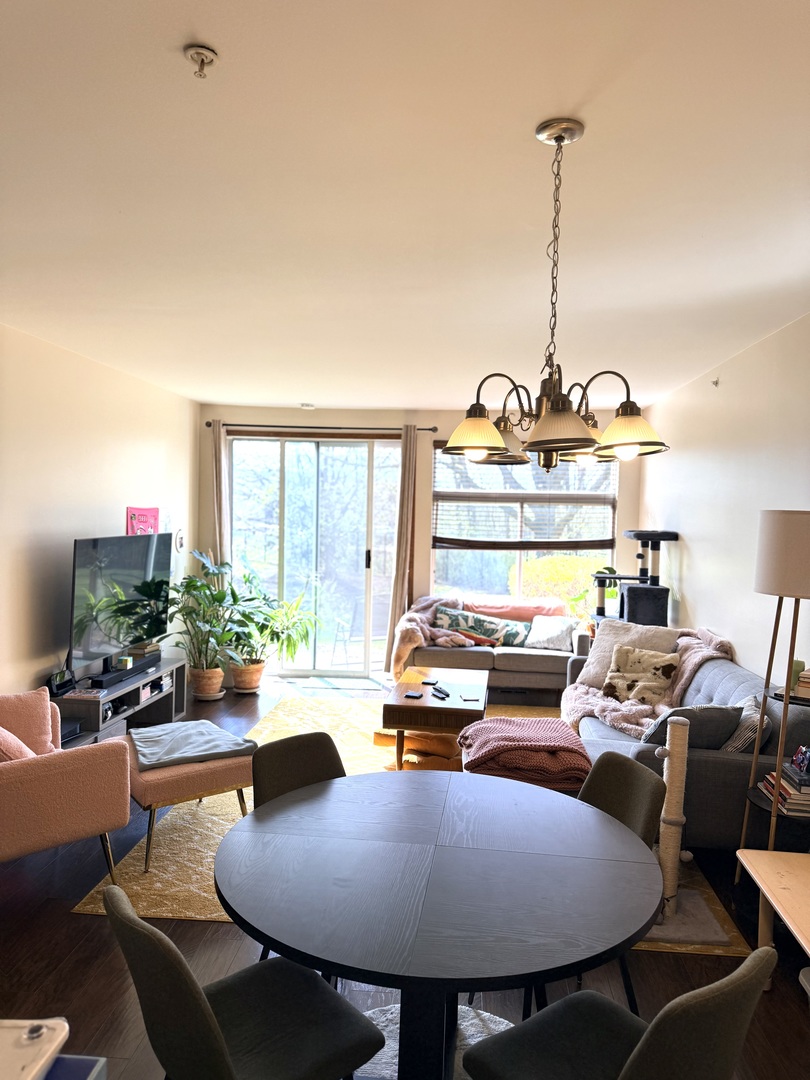 1159 East Addison Avenue Lombard, IL 60148 - Photo 6 of 14 a view of a dining room with furniture
