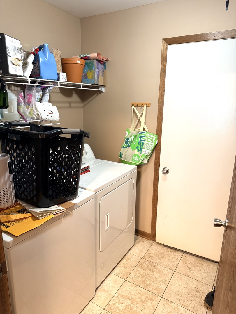 1159 East Addison Avenue Lombard, IL 60148 - Photo 8 of 14 a kitchen with stainless steel appliances granite countertop a sink and a stove