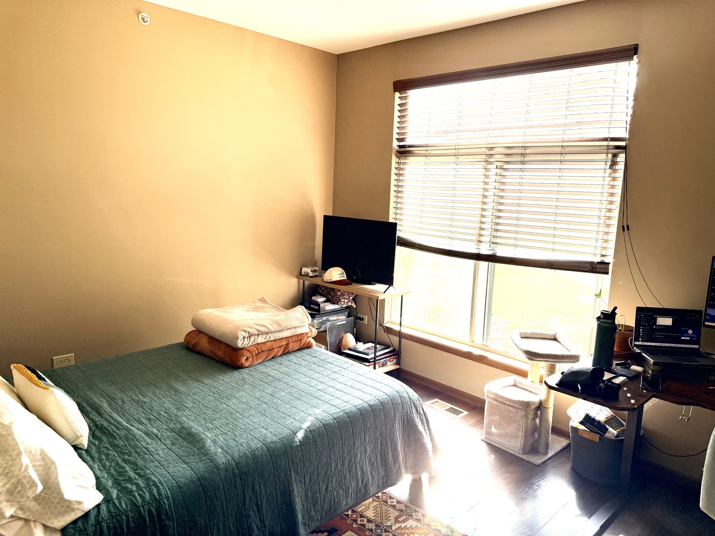 1159 East Addison Avenue Lombard, IL 60148 - Photo 9 of 14 a bedroom with a bed and a window