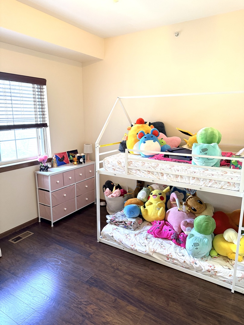 1159 East Addison Avenue Lombard, IL 60148 - Photo 10 of 14 a room with toys and wooden floor