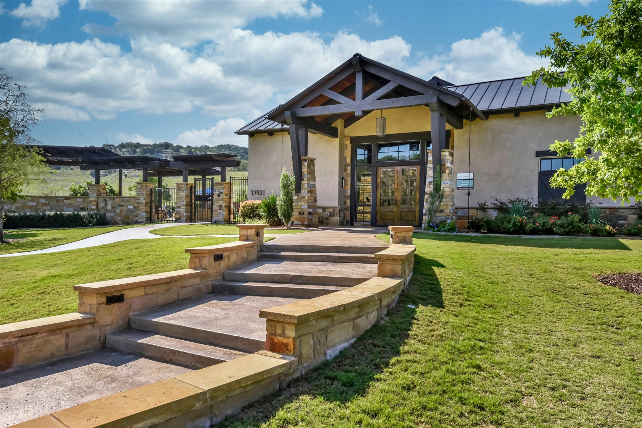 17820 Limestone Spring Lane Austin, TX 78738 - Photo 26 of 35 a view of a house with swimming pool and a yard
