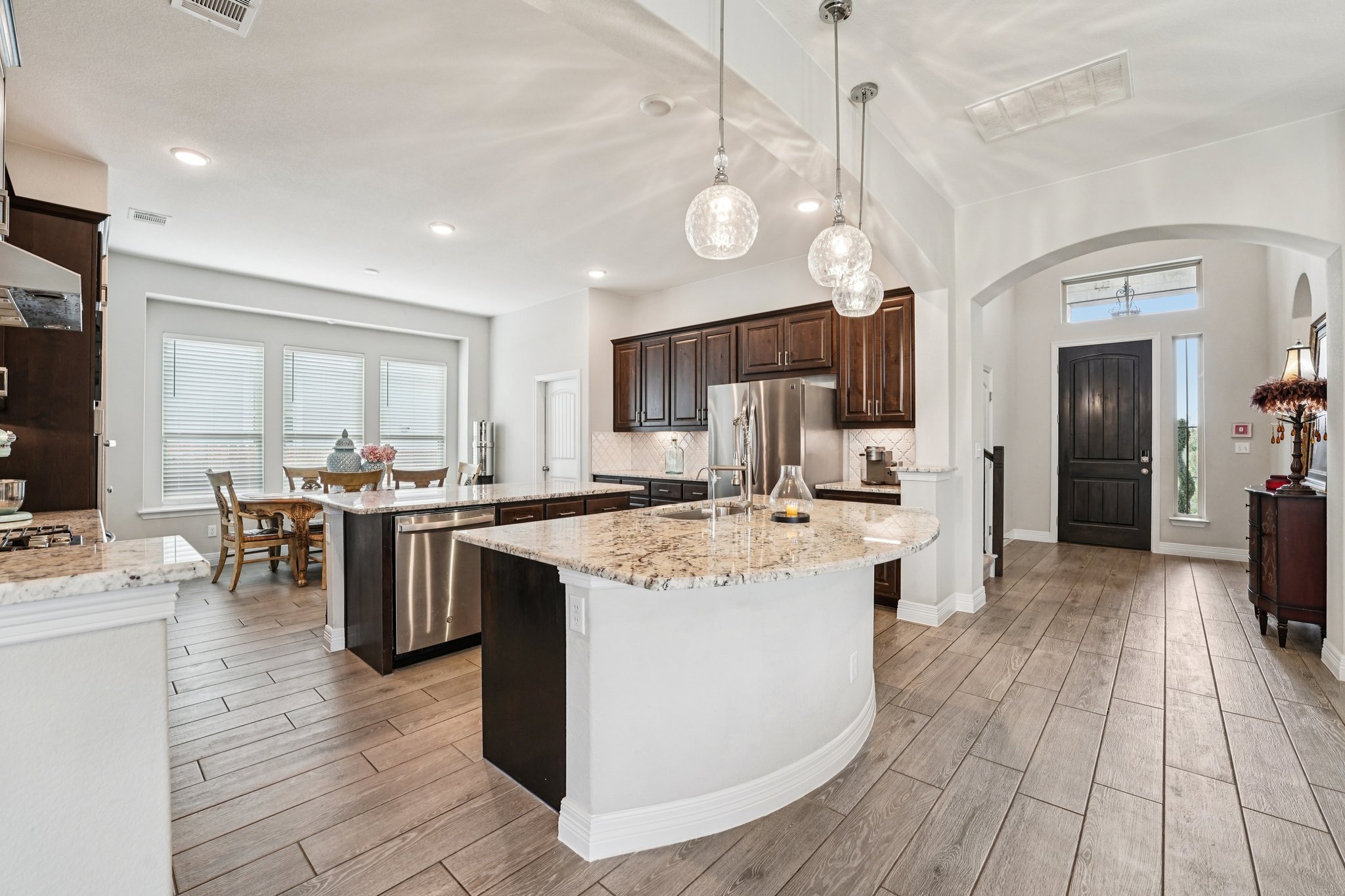 17820 Limestone Spring Lane Austin, TX 78738 - Photo 10 of 35 a large kitchen with lots of counter space a sink and appliances