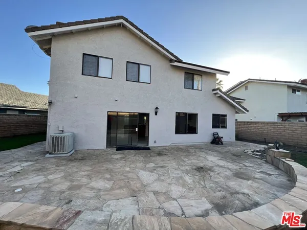 a house view with a outdoor space
