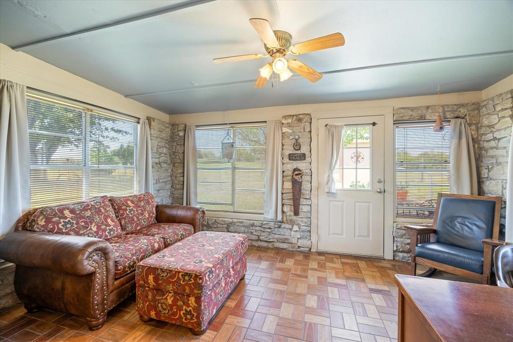 17305 Highway 281 Hico, TX 76457 - Photo 19 of 28 a living room with furniture and a large window
