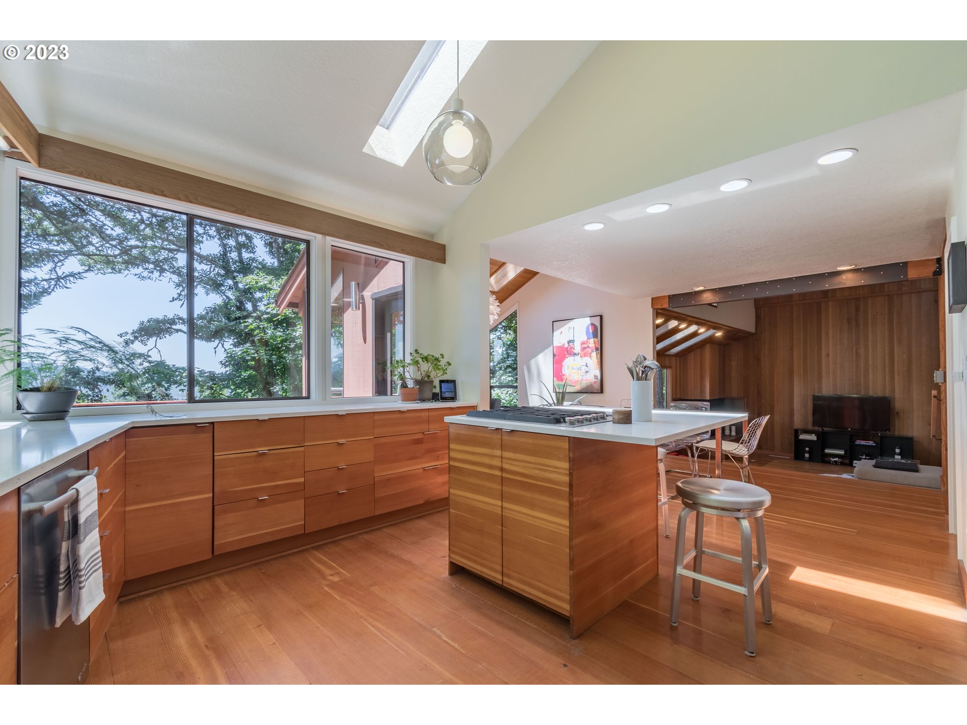 2780 Cresta De Ruta Street Eugene, OR 97403 - Photo 12 of 48 a open kitchen with stainless steel appliances granite countertop a sink table and chairs