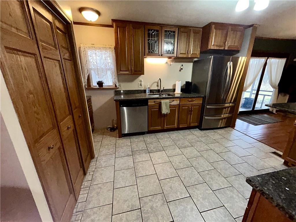 194 Nutt Road Grove City, PA 16127 - Photo 13 of 38 Large Pantry Cupboard; There are Washer / Dryer Hookups Here for 1st Floor Laundry