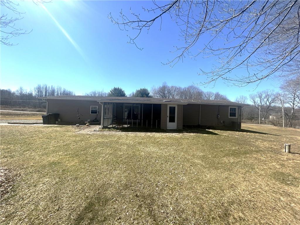 194 Nutt Road Grove City, PA 16127 - Photo 30 of 38 Back of Home w/ Screened in Patio