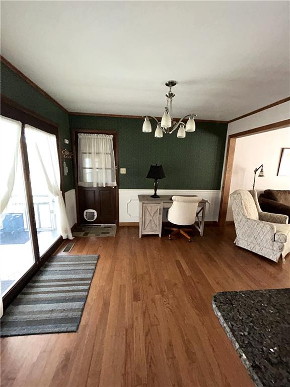 194 Nutt Road Grove City, PA 16127 - Photo 9 of 38 Dining Room is Centrally Located to the Living Room and Kitchen. The Glass Door Opens to the Covered & Screened Back Patio