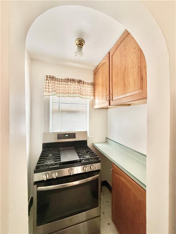 3232 California Avenue Pittsburgh, PA 15212 - Photo 14 of 38 a stove top oven sitting inside of a kitchen