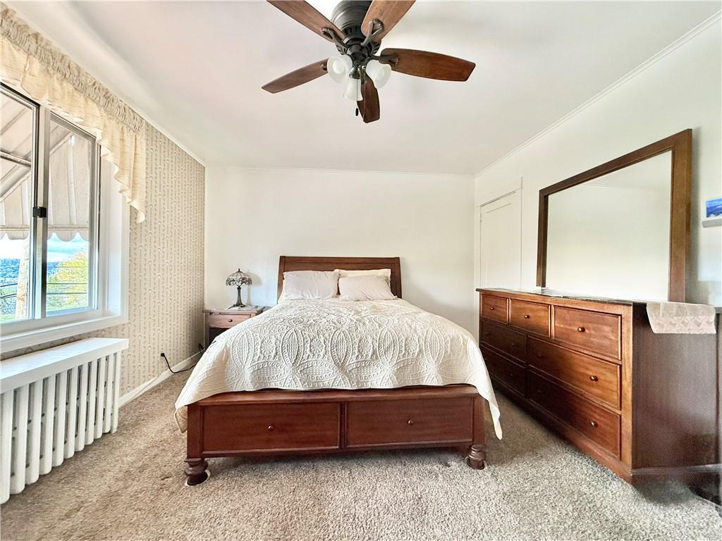 3232 California Avenue Pittsburgh, PA 15212 - Photo 20 of 38 a bedroom with a bed and window