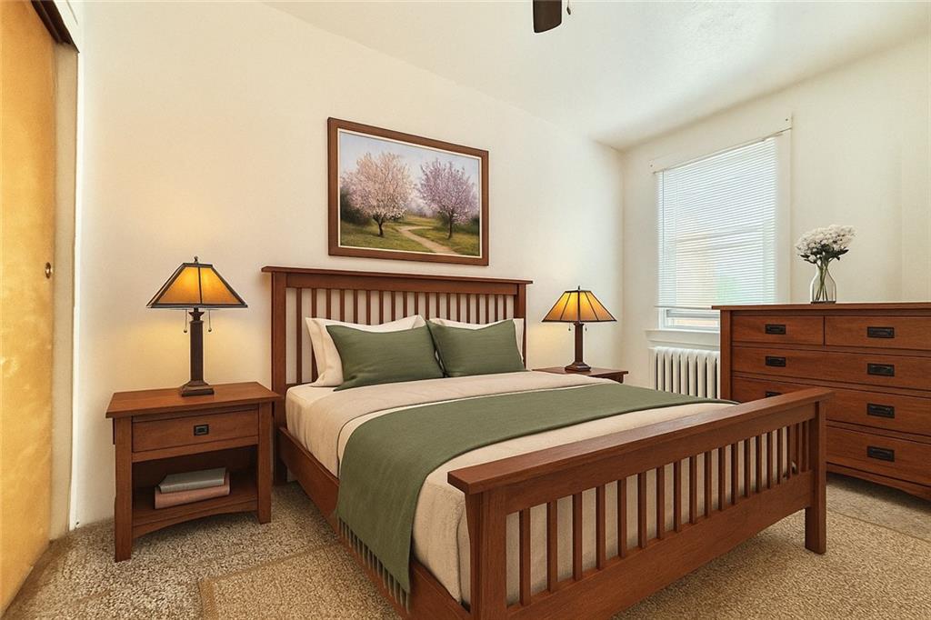 3232 California Avenue Pittsburgh, PA 15212 - Photo 22 of 38 a bedroom with two beds and lamp