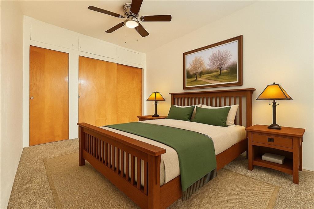 3232 California Avenue Pittsburgh, PA 15212 - Photo 23 of 38 a bedroom with a bed and a chandelier