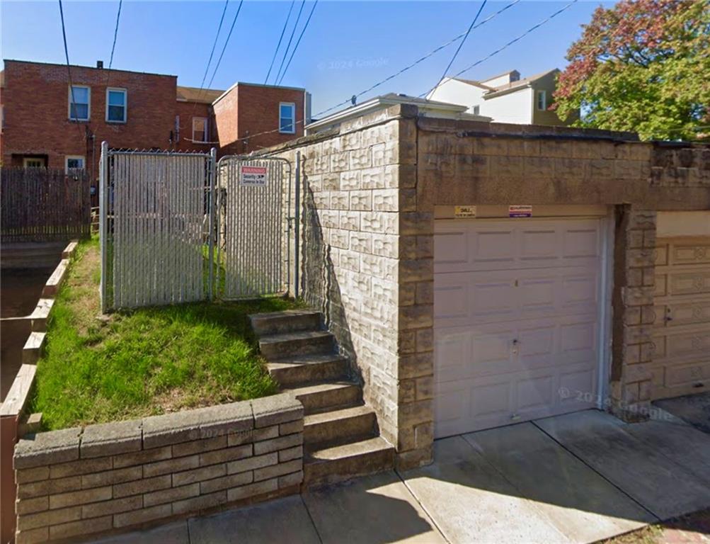3232 California Avenue Pittsburgh, PA 15212 - Photo 34 of 38 a front view of a house with a garden