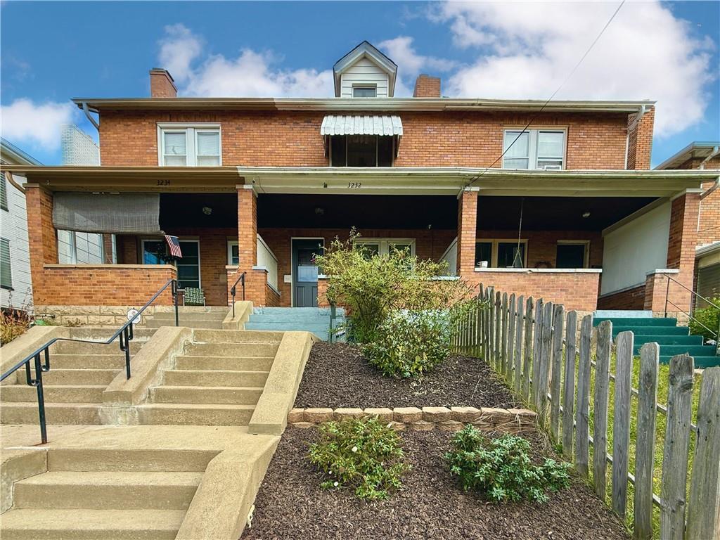 3232 California Avenue Pittsburgh, PA 15212 - Photo 35 of 38 a front view of a house with a garden