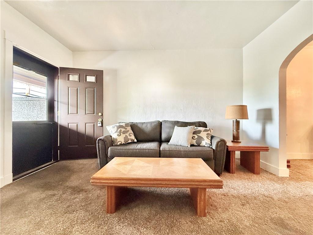 3232 California Avenue Pittsburgh, PA 15212 - Photo 5 of 38 a living room with furniture and a lamp