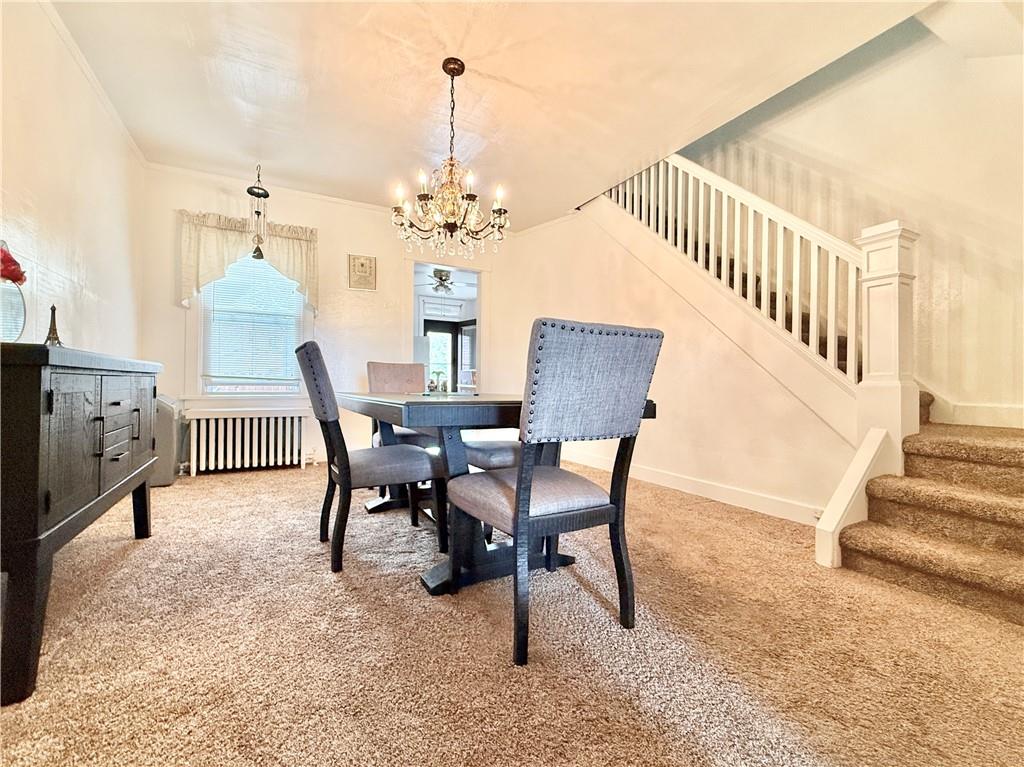 3232 California Avenue Pittsburgh, PA 15212 - Photo 8 of 38 a view of a dining room with furniture and wooden floor