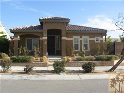 67698 Rio Arapaho Road Cathedral City, CA 92234 - Photo 1 of 11 a front view of a house with porch