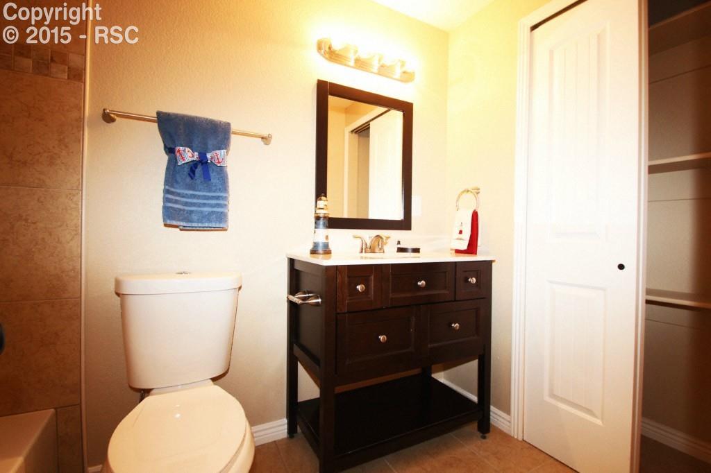 53 Lazy W Road Fountain, CO 80817 - Photo 24 of 31 Full basement bath with large linen closet.