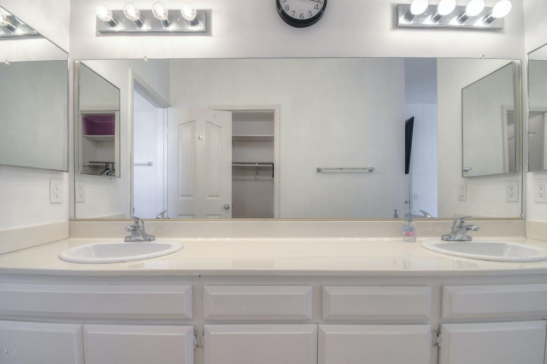 430 Percy Street Oxnard, CA 93033 - Photo 24 of 35 a bathroom with a sink and a mirror