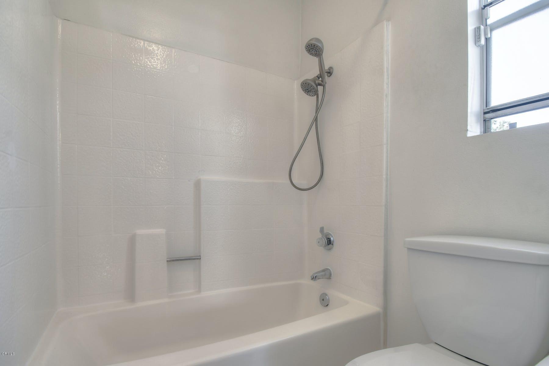 430 Percy Street Oxnard, CA 93033 - Photo 26 of 35 a bathroom with a bath tub and a shower