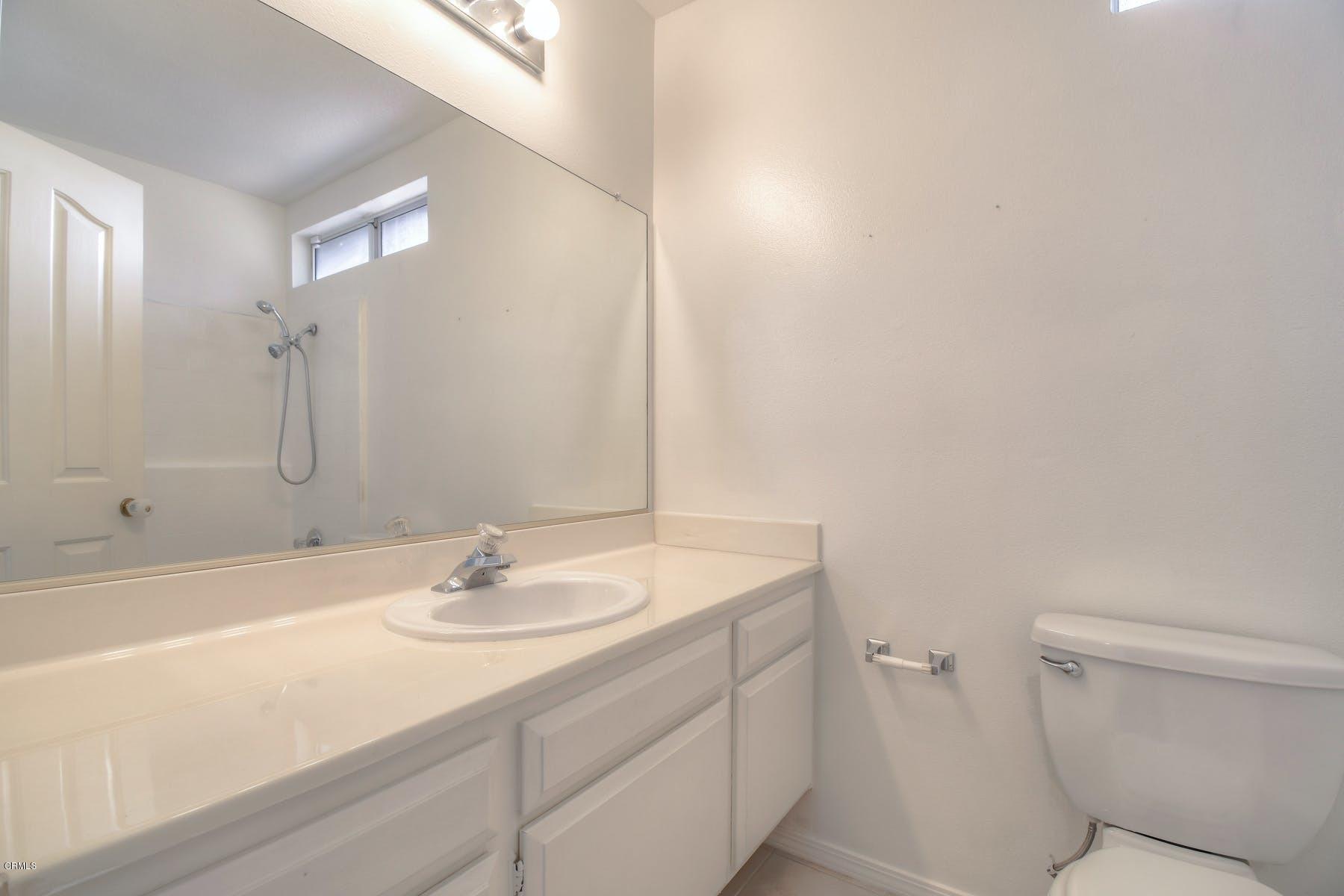 430 Percy Street Oxnard, CA 93033 - Photo 27 of 35 a bathroom with a sink toilet and shower