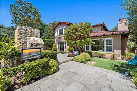 a house view with a garden space
