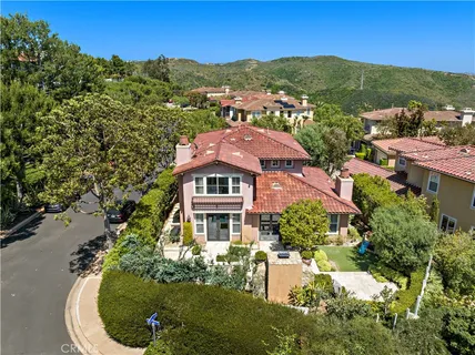 an aerial view of a house with a garden