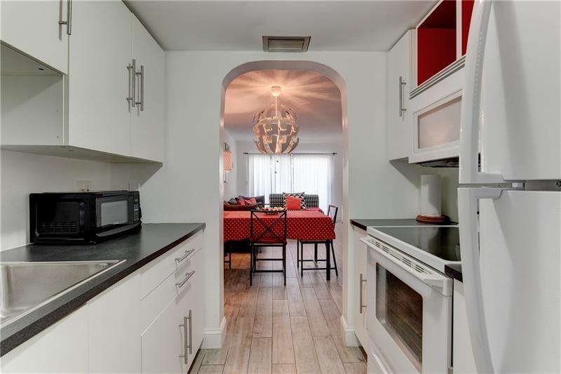 1461 South Ocean Boulevard, Unit 211 Lauderdale-by-the-Sea, FL 33062 - Photo 21 of 65 NO ASSESSMENT!!. THE BUILDING HAD A $1.5 MILLION DOLLAR RESTORATION WITH ITS 40 YEAR INSPECTION, SIRS, RESERVES, ASSESSMENTS ALL PAID BY SELLER!!!.. A BEACH & BOAT LOVERS DREAM!!.. A PRIVATE DEEDED BEACH ACCESS ACROSS THE STREET & NEW BOAT DOCK TO LIVE THE LIFESYTLE OF LAUDERDALE BY THE SEA. THIS HIGHLY DEMANDED 1 BEDROOM 1.5 BATH UNIT FEATURES THE PERFECT LOCATION IN A WELL MANAGED COMPLEX WITH ALL CERTIFICATIONS COMPLETED. THE UNIT IS MOVE IN READY. IT OFFERS RELAXING COURTYARD AND POOL VIEWS!