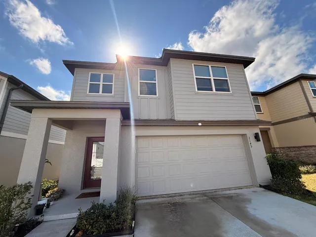 a view of a house with a garage