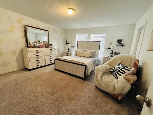 a bathroom with a sink double vanity and a mirror