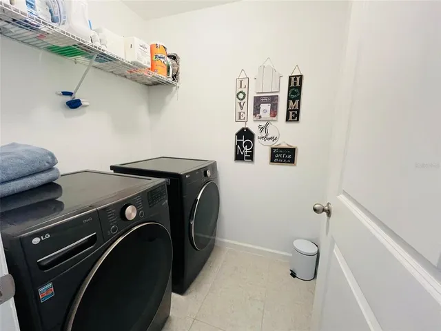a bathroom with a sink mirror and toilet