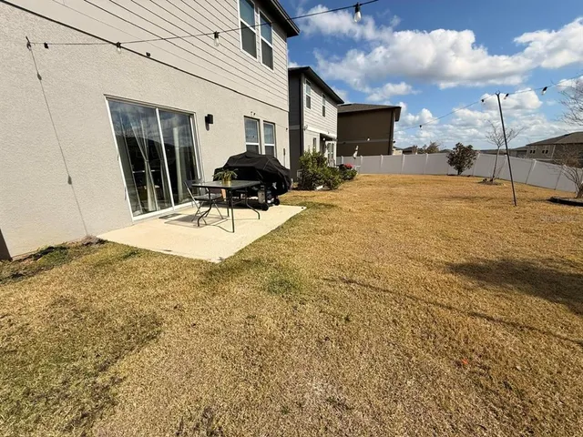 a view of a house with a patio