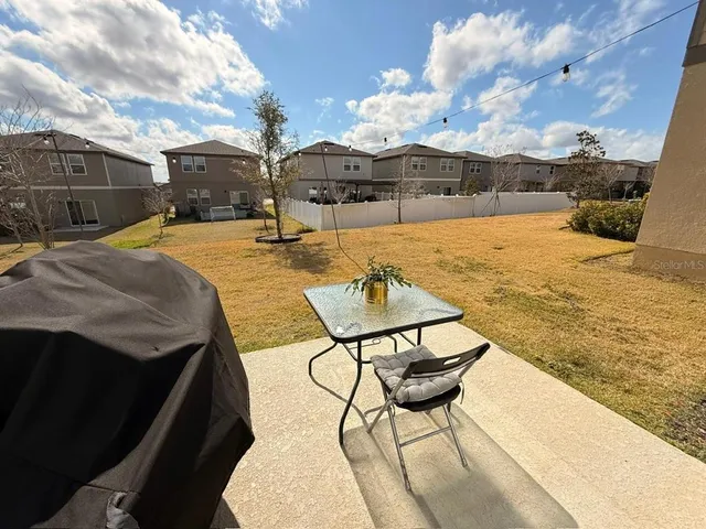 a view of a terrace with chairs